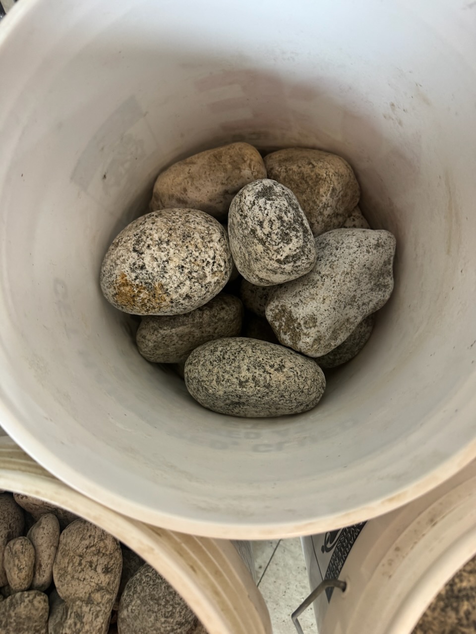Salt and pepper granite rock. White with black speckle.